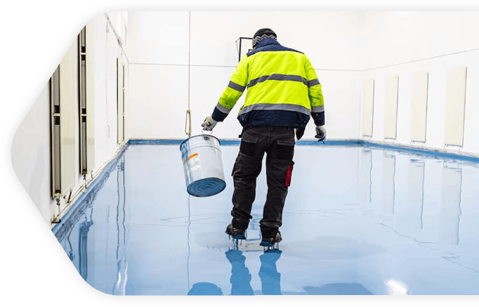 Close-up of liquid resin being poured into  floor